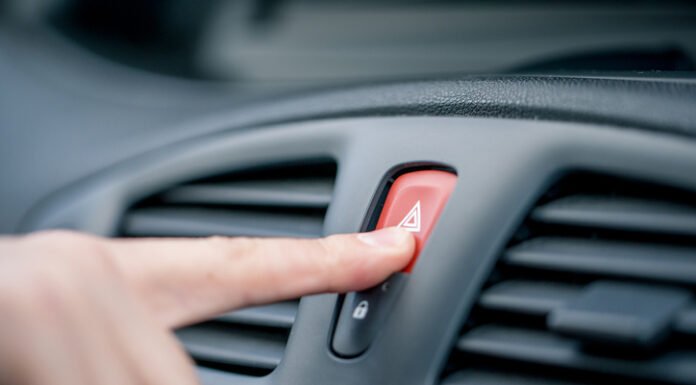 Why do my hazard lights come on when I open my door? hazard lights